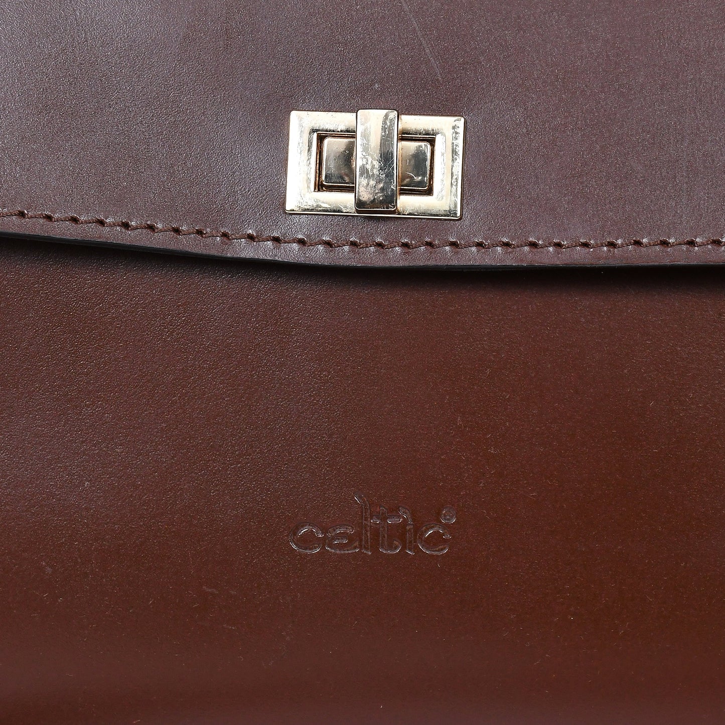  brown color pure leather sling bag for girls and women with glorious finished work. - INDIA