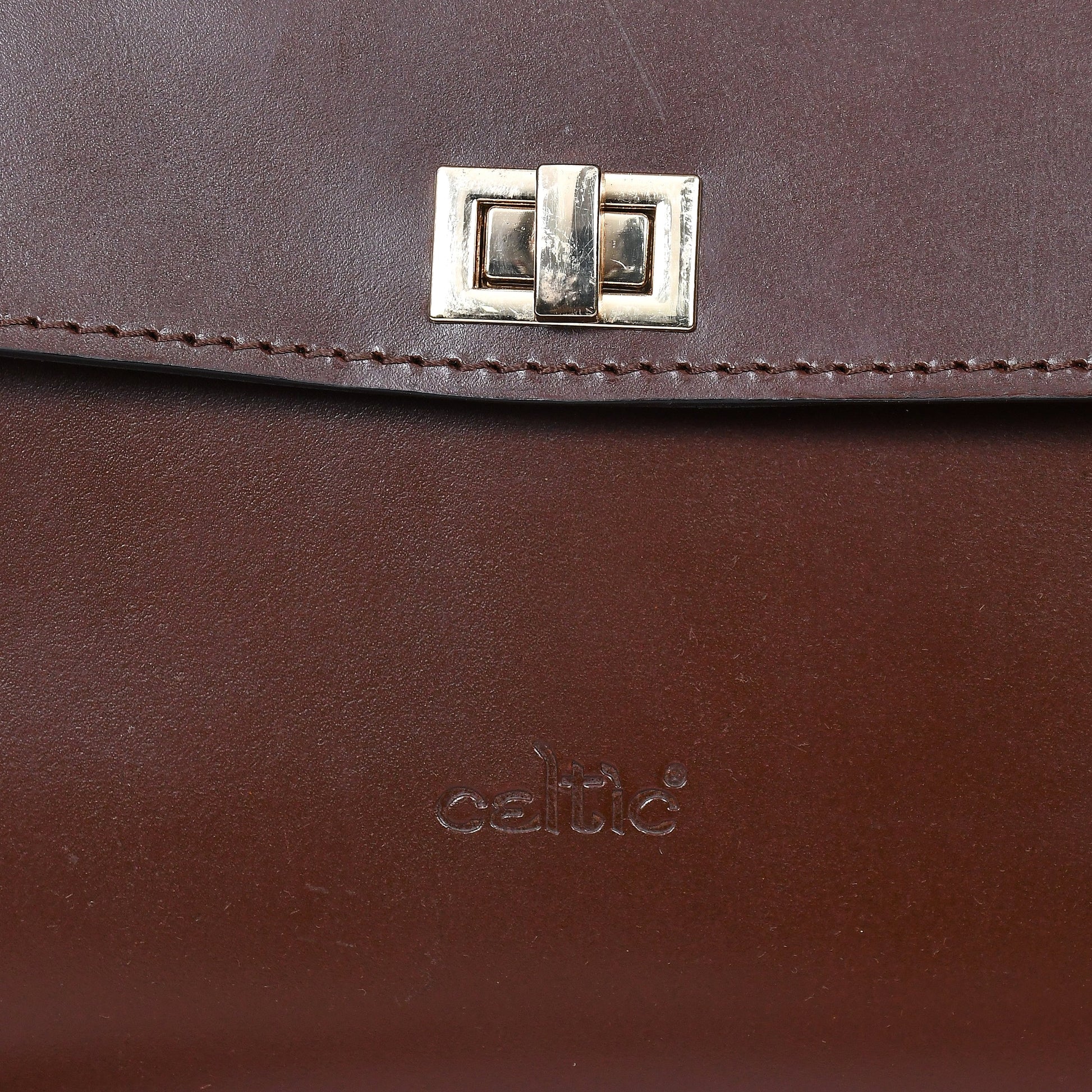  brown color pure leather sling bag for girls and women with glorious finished work. - INDIA